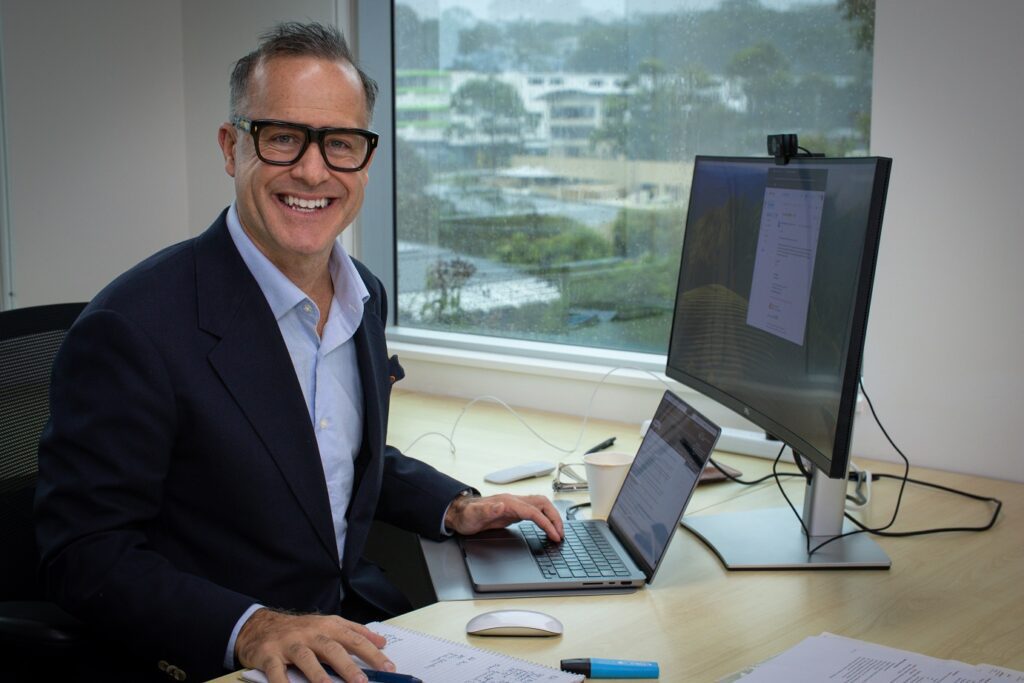 Paul Goudie CEO at desk
