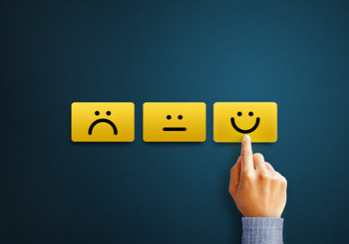 Hand of client show a feedback with smiley face card. Service rating, satisfaction concept Creating a Positive Learning Culture artwork