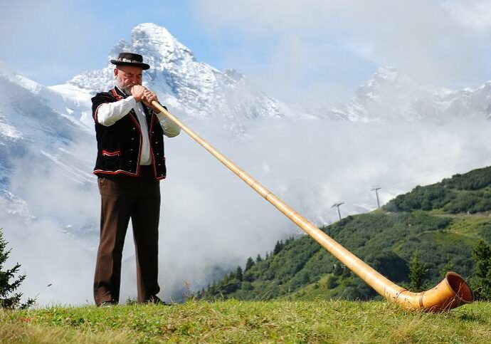 Announcement4 - Bridge Male in mountains with trumpet